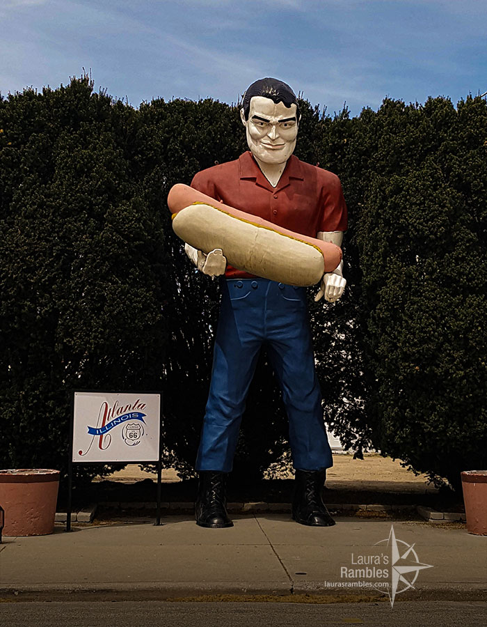 Paul Bunyan holding a hot dog
