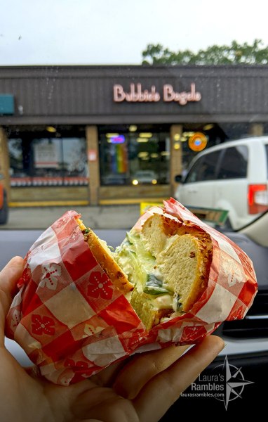 Onion bagel with veggie cream cheese and cucumber slices from Bubbies Bagels in Traverse City, MI